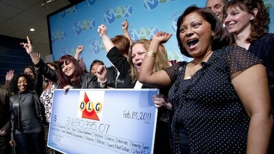 Bell 19 Lotto Max Winners with Oversized Cheque