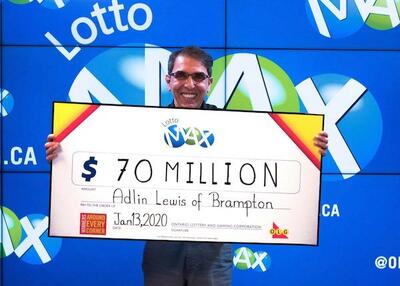 Canada Lotto Max Winner Adlin Lewis with Oversized Cheque