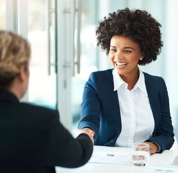 Client Shaking Hands with a Financial Advisor