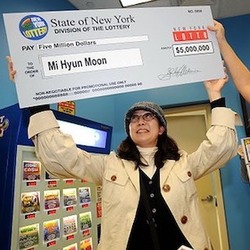 First-Time Lottery Winner Mi Hyun Moon Holding Oversized Check