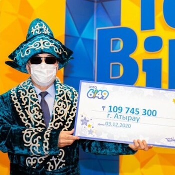 Kazakhstan Loto 649 Winner in Blue Wizard Outfit