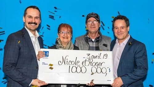 Loto Quebec Winners Nicole Pedneault and Roger Larocque with Oversized Cheque