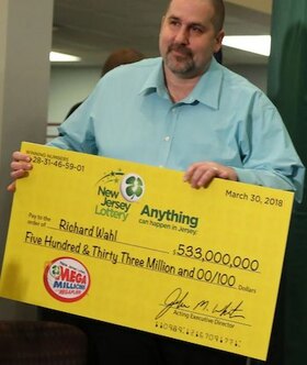 Mega Millions Winner Richard Wahl Holding Oversized Cheque