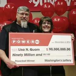 Powerball Winner Lisa Quam Holding Large Check with Husband