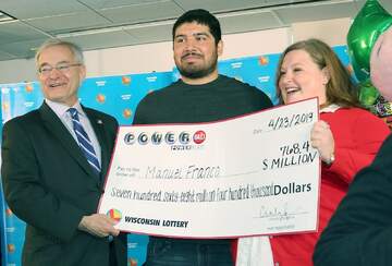 Powerball Winner Manuel Franco with Oversized Cheque