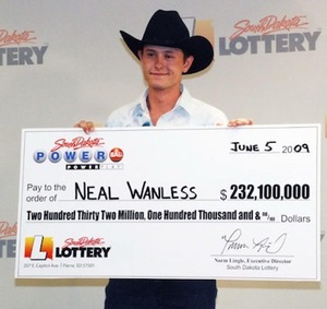 Powerball Winner Neal Wanless Holding Oversized Check
