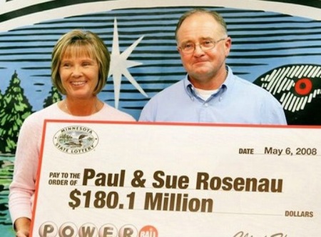 Powerball Winners Paul and Sue Rosenau Holding Oversized Check